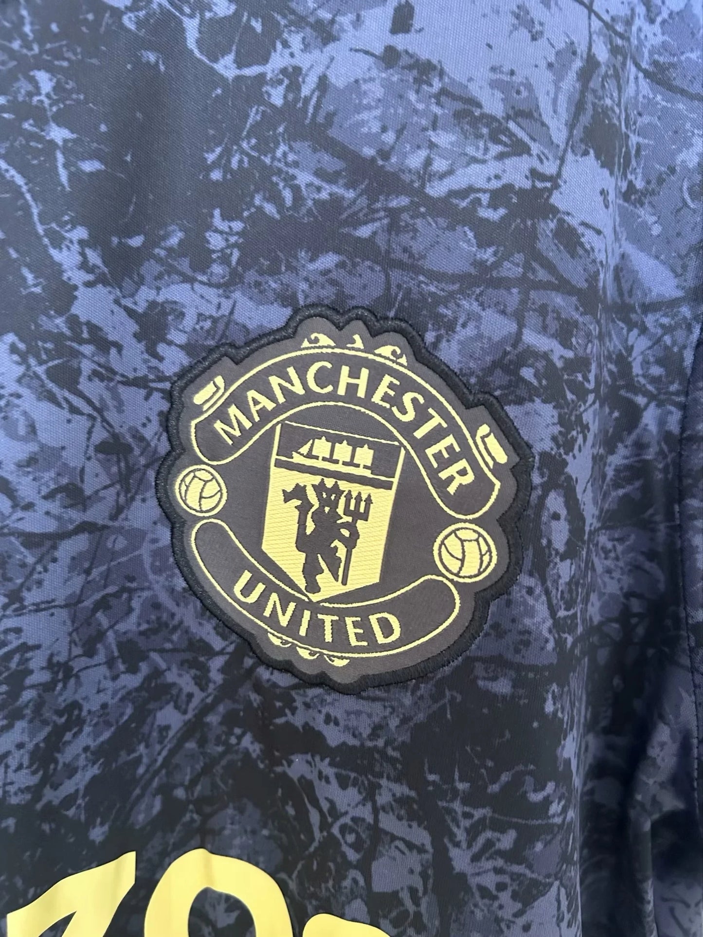 2023/2024 Manchester United Co-Branded Stone Rose Kit